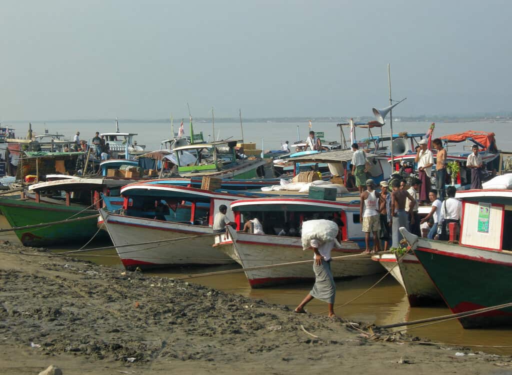 boats along the shore of the Irrawaddy river in Mandalay