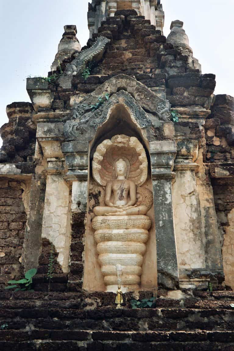 Buddha seated on naga at Si Satchanalai