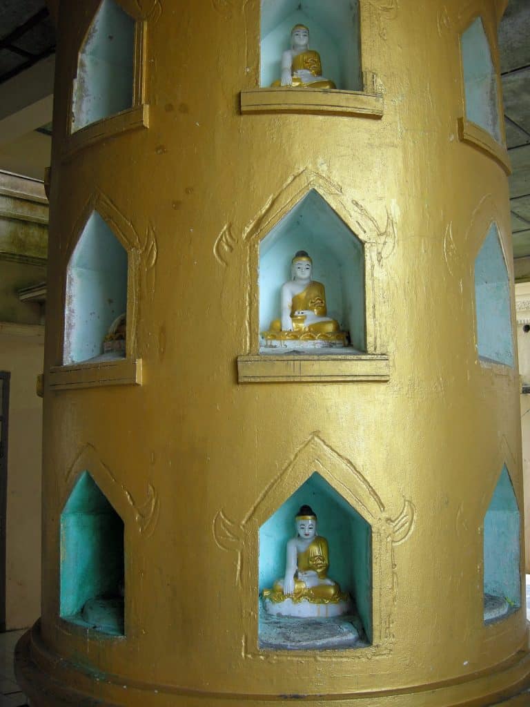 round shrine with Buddha statues at Mount Popa hill