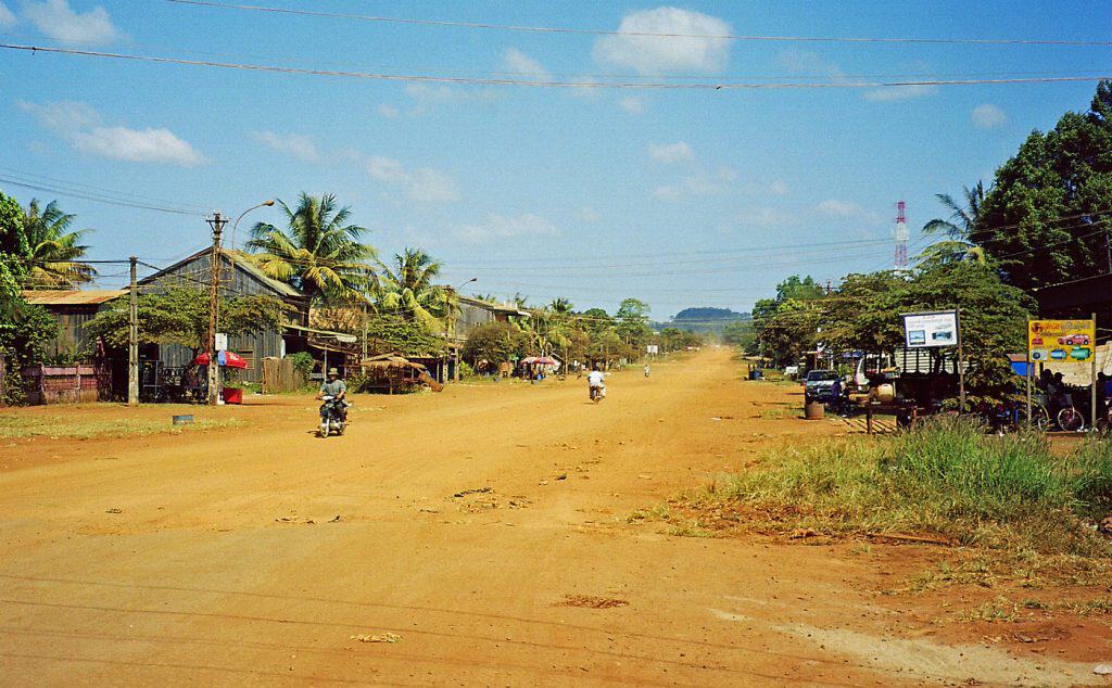main city road: chewing sand in Banlung