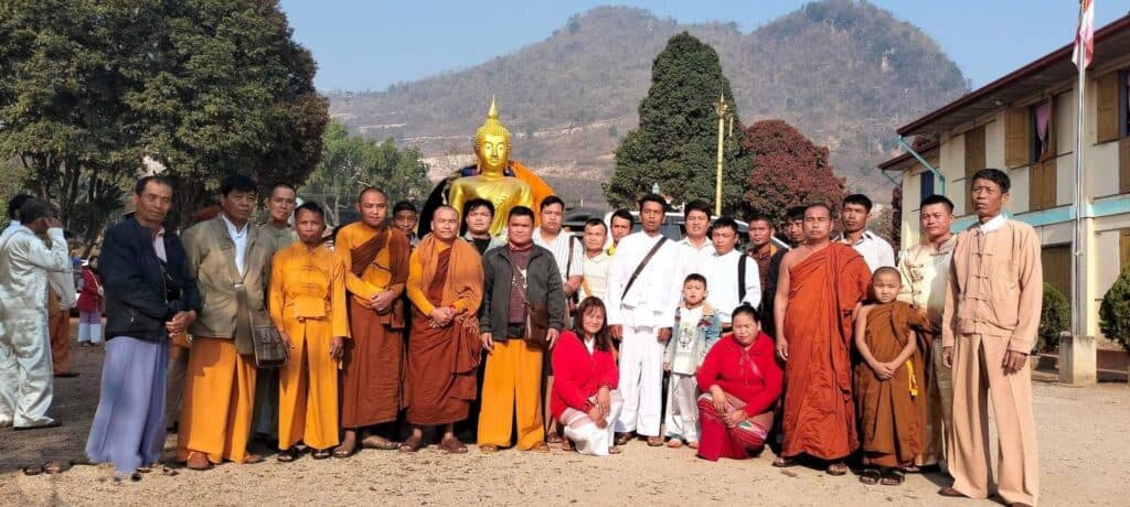 community building by Buddha statue donation