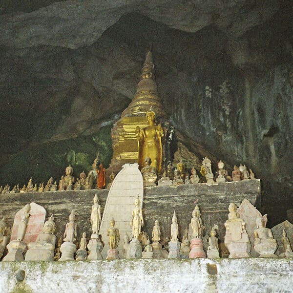 miniature Buddha sculptures in the Pak Ou caves