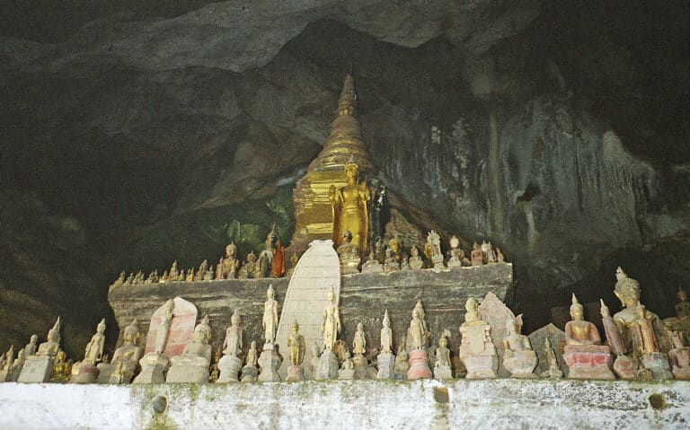 miniature Buddha sculptures in the Pak Ou caves